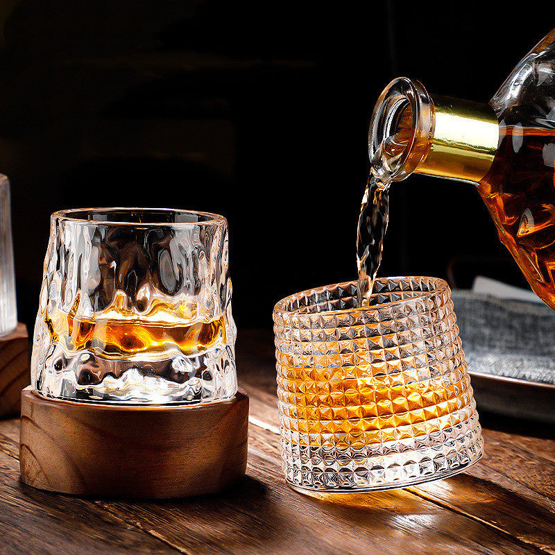 Thickened rotating tumbler whiskey glass