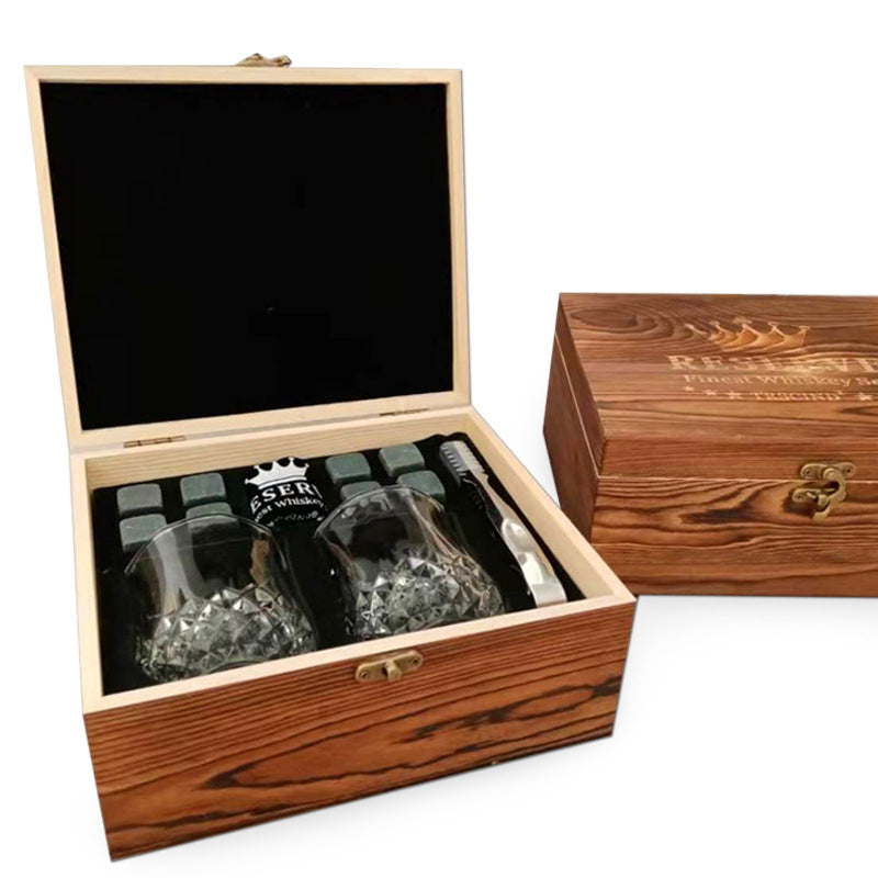 A wooden box for whiskey glass marble ice cubes