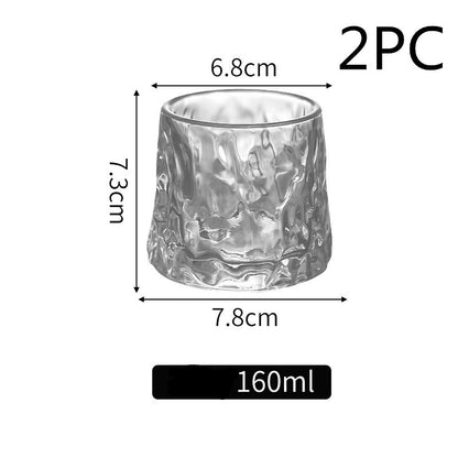 Thickened rotating tumbler whiskey glass